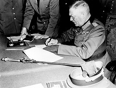 'Field Marshall Wilhelm Keitel, signing the ratified surrender' by Marion Doss